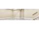 Unfinished basement area with tiled floors and a staircase at 206 Woodridge Pkwy, Canton, GA 30115