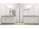 Double vanity bathroom with granite countertops and ample storage at 206 Woodridge Pkwy, Canton, GA 30115