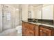 Bathroom with granite countertop and walk-in shower at 206 Woodridge Pkwy, Canton, GA 30115