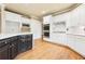 Spacious kitchen with white cabinets, stainless steel appliances, and island at 206 Woodridge Pkwy, Canton, GA 30115