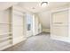 Large walk-in closet with built-in shelving and hanging rods at 206 Woodridge Pkwy, Canton, GA 30115