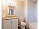 Updated bathroom with granite countertop and bathtub at 3485 Tarragon Dr, Decatur, GA 30034