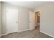Spacious bedroom with neutral walls and carpet at 3485 Tarragon Dr, Decatur, GA 30034