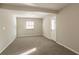 Spacious bonus room with neutral wall paint and carpet flooring at 3485 Tarragon Dr, Decatur, GA 30034