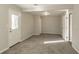 Bright bonus room featuring carpet flooring and exterior access at 3485 Tarragon Dr, Decatur, GA 30034