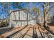House exterior showcasing gray siding, stone accents and driveway at 3485 Tarragon Dr, Decatur, GA 30034