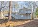 Gray sided two-story house with deck and elevated balcony at 3485 Tarragon Dr, Decatur, GA 30034