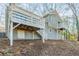 Two-story house with gray siding, deck, and elevated balcony at 3485 Tarragon Dr, Decatur, GA 30034