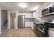 Modern kitchen with stainless steel appliances and granite countertops at 3485 Tarragon Dr, Decatur, GA 30034