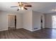 Open living area with hardwood floors and access to other rooms at 3485 Tarragon Dr, Decatur, GA 30034