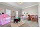 bedroom with pink play tent and daybed at 127 Royal Burgess Way, Mcdonough, GA 30253