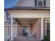 Brick front porch with rocking chairs at 314 Lakeside Trce, Canton, GA 30115