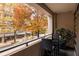 Private balcony with city views and seating for two at 805 Peachtree Ne St # 212, Atlanta, GA 30308