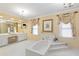 Elegant bathroom with a large soaking tub and double vanity at 1120 Heards Ferry Rd, Sandy Springs, GA 30328