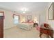 Comfortable guest bedroom with a king-size bed and a sitting area at 1120 Heards Ferry Rd, Sandy Springs, GA 30328