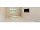Spacious bedroom with a large window and carpeted floors at 1120 Heards Ferry Rd, Sandy Springs, GA 30328