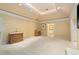 Bright and airy Primary bedroom with ensuite bathroom access at 1120 Heards Ferry Rd, Sandy Springs, GA 30328
