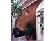 Brick courtyard with fountain, lush plants, and glass roof at 1120 Heards Ferry Rd, Sandy Springs, GA 30328
