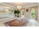 Formal dining room with mirror wall and chandelier at 1120 Heards Ferry Rd, Sandy Springs, GA 30328