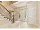 Spacious entryway with a staircase and access to other rooms at 1120 Heards Ferry Rd, Sandy Springs, GA 30328