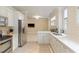 Well-equipped kitchen featuring stainless steel appliances and ample cabinetry at 1120 Heards Ferry Rd, Sandy Springs, GA 30328