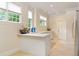 Bright kitchen boasts a large island and plenty of counter space at 1120 Heards Ferry Rd, Sandy Springs, GA 30328