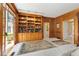 Spacious library with hardwood built-ins and access to outdoor patio at 1120 Heards Ferry Rd, Sandy Springs, GA 30328