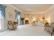 Living room features a fireplace and ample seating at 1120 Heards Ferry Rd, Sandy Springs, GA 30328