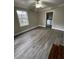 Comfortable bedroom with ample natural light and durable floors at 240 Dogwood Dr, Canton, GA 30114