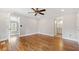 Spacious bedroom with hardwood floors and access to an en-suite bathroom at 240 Dogwood Dr, Canton, GA 30114