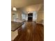 Inviting living room featuring hardwood floors, a fireplace and custom built-ins at 240 Dogwood Dr, Canton, GA 30114