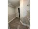 Spacious walk-in closet featuring open shelving and hardwood floors at 240 Dogwood Dr, Canton, GA 30114