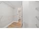Spacious walk-in closet with wood floor and wire shelving at 240 Dogwood Dr, Canton, GA 30114