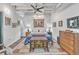 Bright bedroom with hardwood floors and ceiling fan at 805 Peachtree St # 515, Atlanta, GA 30308