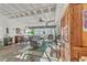 Spacious living room with hardwood floors, large windows, and a ceiling fan at 805 Peachtree St # 515, Atlanta, GA 30308