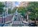 Street view of a city intersection with bike lanes at 805 Peachtree St # 515, Atlanta, GA 30308