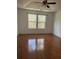 Bright bedroom featuring hardwood floors and large windows at 101 Ellis Dr # 101, Conyers, GA 30012