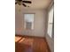 Bright bedroom featuring wood flooring and two large windows at 101 Ellis Dr # 101, Conyers, GA 30012