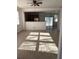 Open living room with tile flooring and a view of the kitchen at 101 Ellis Dr # 101, Conyers, GA 30012