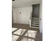 Interior view showing staircase leading to the upper level at 101 Ellis Dr # 101, Conyers, GA 30012