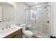 Modern bathroom with frameless shower and pebble tile floor at 148 Walker Nw Rd, Cartersville, GA 30121
