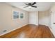 Spacious bedroom with hardwood floors, ceiling fan and window at 148 Walker Nw Rd, Cartersville, GA 30121