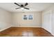 Hardwood floors and double closet in this bright bedroom with large windows at 148 Walker Nw Rd, Cartersville, GA 30121