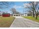 White ranch home with covered carport and expansive yard at 148 Walker Nw Rd, Cartersville, GA 30121