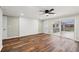 Gathering room with wood-look flooring, brick fireplace, and sliding doors at 148 Walker Nw Rd, Cartersville, GA 30121