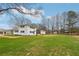 Side view of the house with shed and spacious lawn at 148 Walker Nw Rd, Cartersville, GA 30121