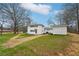 Side view of the house with shed and large backyard at 148 Walker Nw Rd, Cartersville, GA 30121