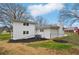 White brick house exterior with landscaping and fenced backyard at 148 Walker Nw Rd, Cartersville, GA 30121