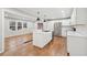 Open concept kitchen with white cabinets and island at 148 Walker Nw Rd, Cartersville, GA 30121