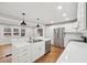 Modern kitchen with white cabinets, stainless steel appliances, and island at 148 Walker Nw Rd, Cartersville, GA 30121